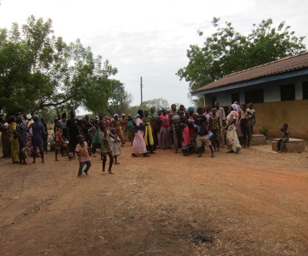 Needy people waiting outside our bungalow